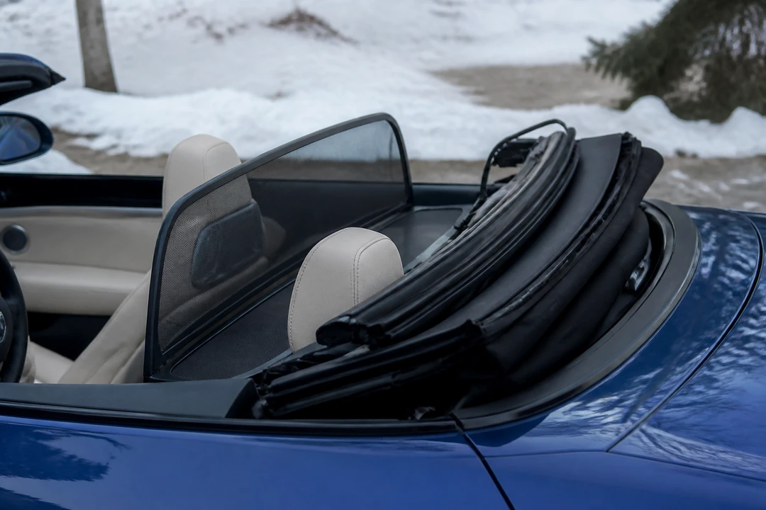BMW 430i Convertible roof mechanism detail for winter open-top driving from Dubai