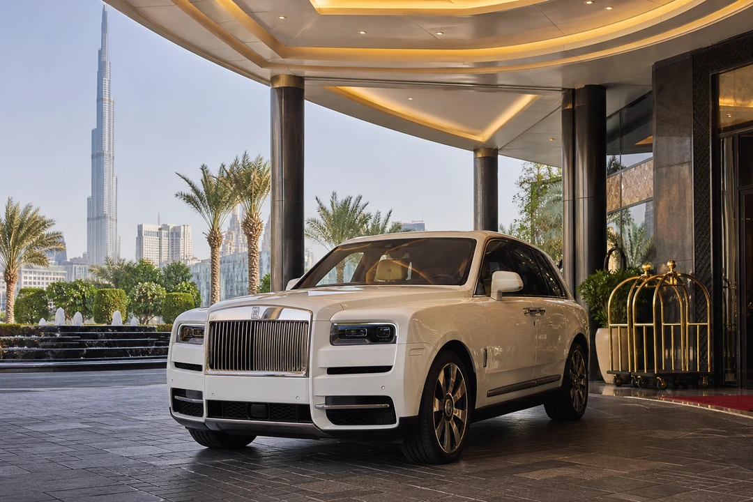 Rolls-Royce Cullinan at a Downtown Dubai hotel porte-cochere for luxury car comparison Dubai