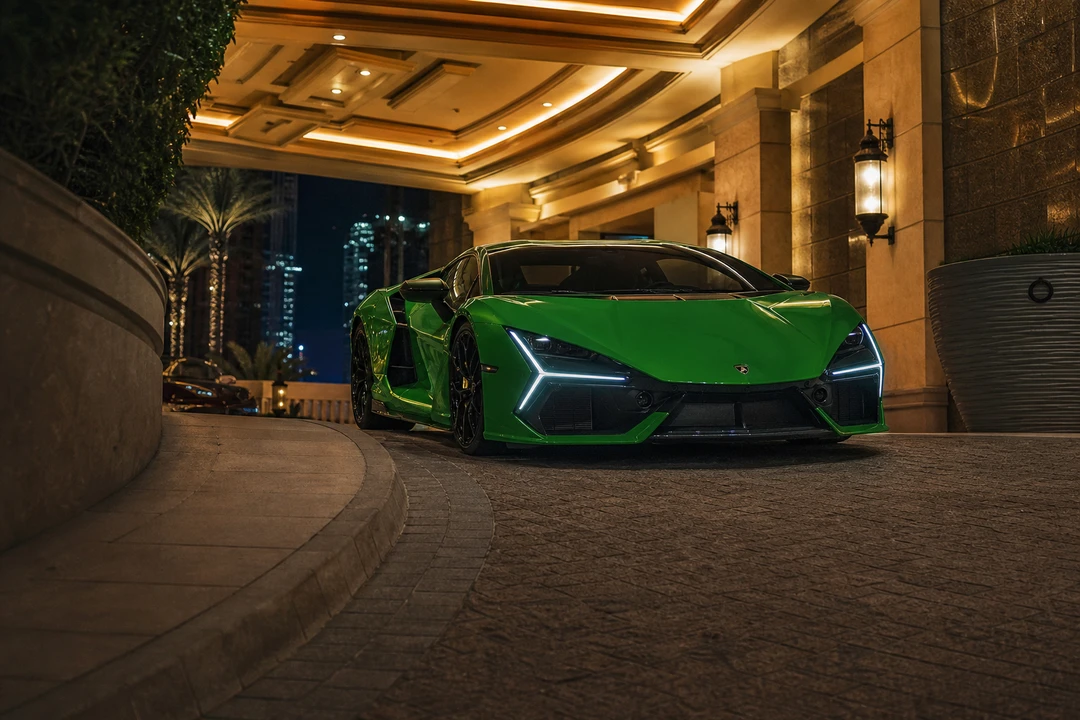 Lamborghini Revuelto at a steep Dubai hotel ramp for luxury car hire Dubai width and nose clearance