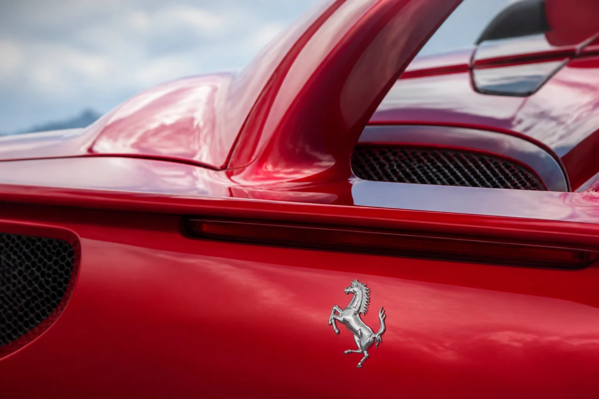 Ferrari 296 GTB rear flying buttress and prancing-horse badge for Ferrari vs Lamborghini rental Dubai