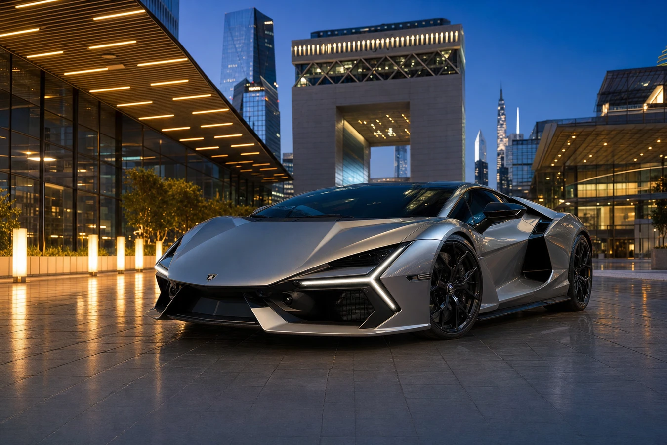 Lamborghini Revuelto rental Dubai guide hero at DIFC Gate Avenue blue hour with hybrid V12 wedge silhouette