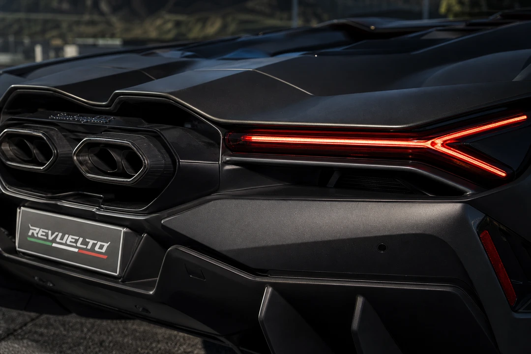 Lamborghini Revuelto rear Y-taillight and hybrid exhaust detail for flagship V12 hypercar character