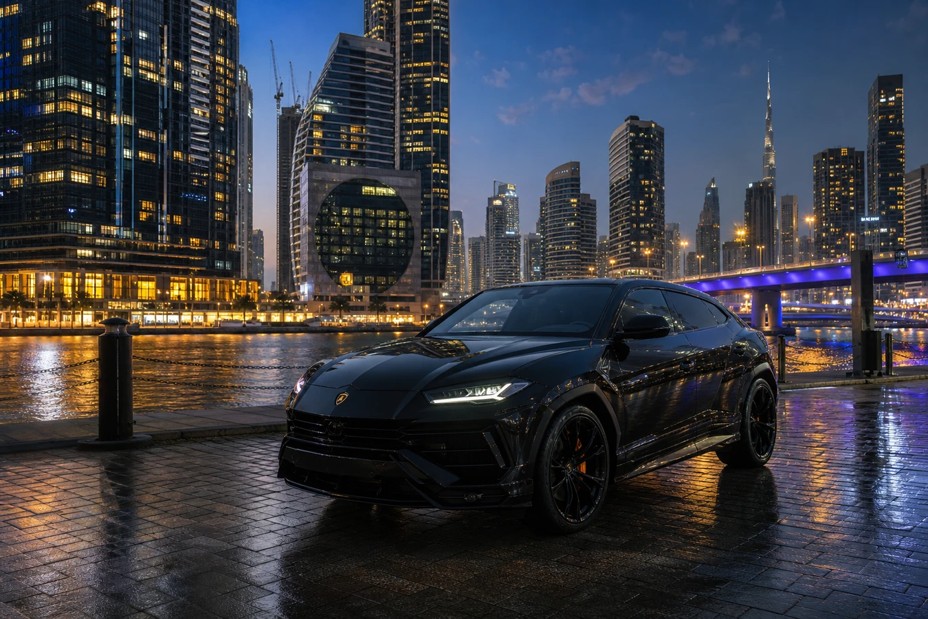 Lamborghini Urus rental Dubai guide hero with black Urus at Business Bay skyline at dusk