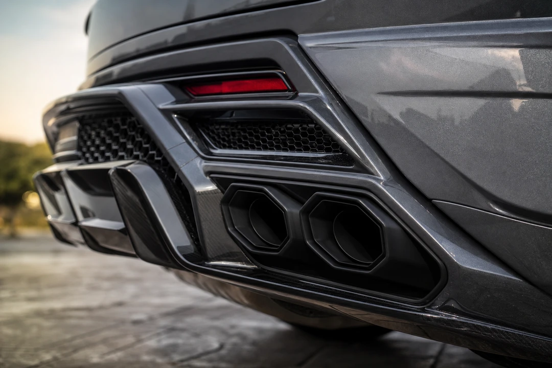 Lamborghini Urus SE model detail with aggressive rear design and hybrid V8 presence