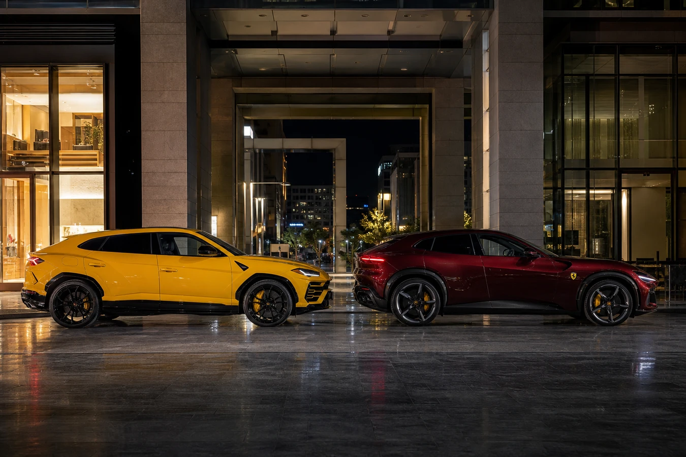 Lamborghini Urus vs Ferrari Purosangue Dubai hero with both super-SUVs at DIFC Gate Avenue at night