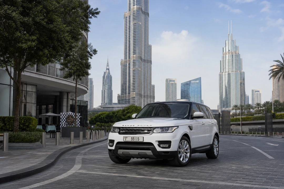 Range Rover at Downtown Dubai for best luxury SUV rental Dubai hotel and city plans