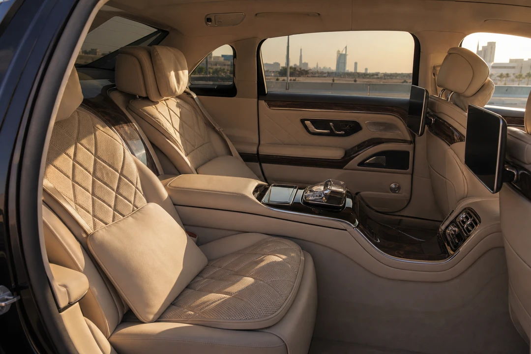 Maybach rear cabin on a Dubai South highway for UAE road trip rental after a DWC arrival