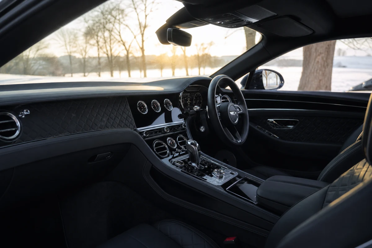 Bentley Continental GTC cabin in winter morning sunlight for longer Dubai driving days