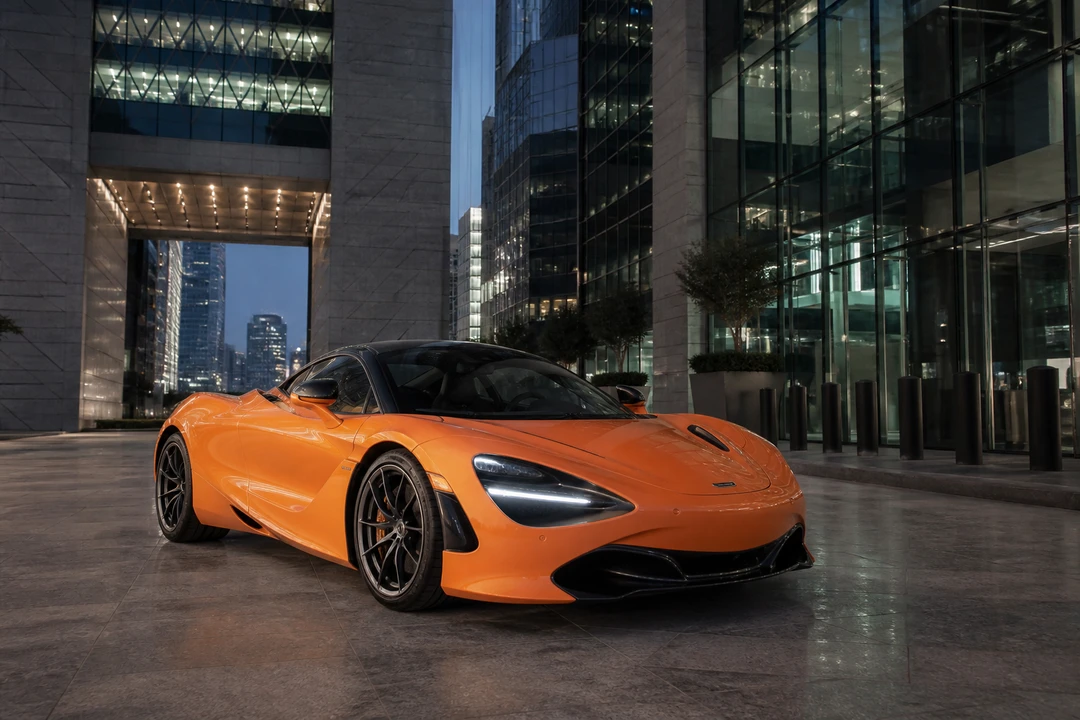 McLaren 720S Coupe at DIFC Gate in evening light for luxury car comparison Dubai Super Series weeks