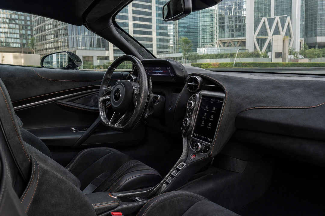 McLaren 720S cockpit with folding driver display for best luxury car Dubai technical evenings