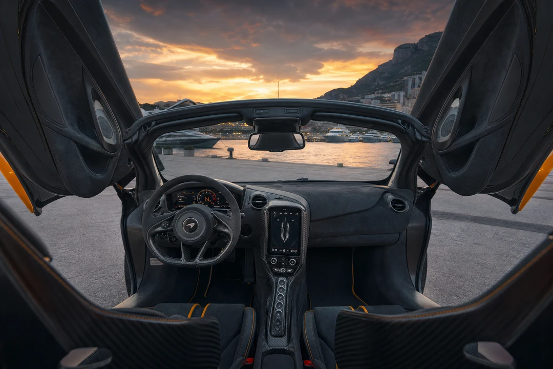 McLaren 750S Spider interior cockpit with dihedral doors raised at Marina dusk