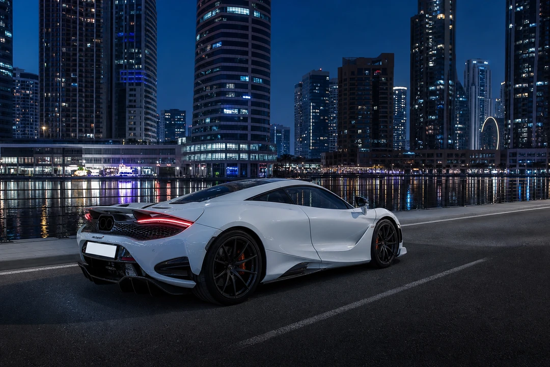 Rent McLaren Dubai: white 750S Coupe on a Business Bay canal road at blue hour for Super Series first-timers