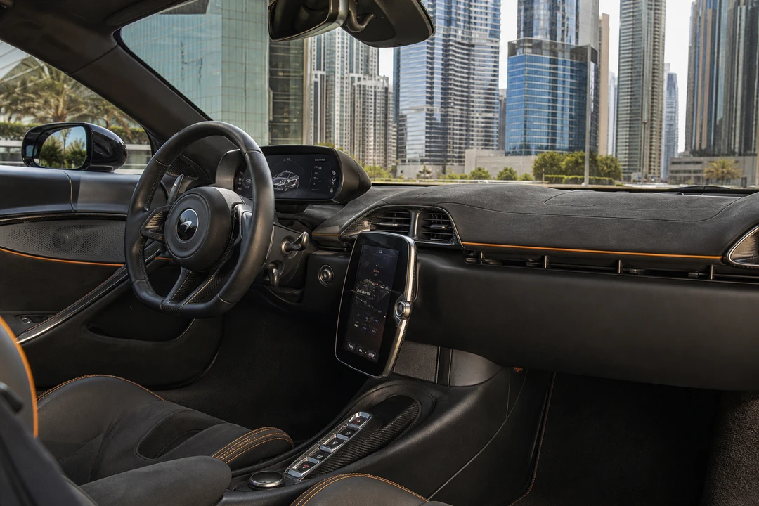 McLaren Artura cockpit for McLaren hire Dubai first-timers with the folding driver display open in daylight