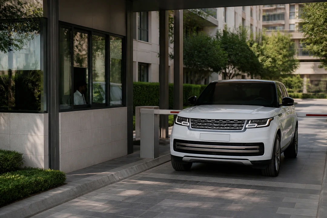Luxury car hire Dubai at a community gatehouse with a Range Rover for a resident booking