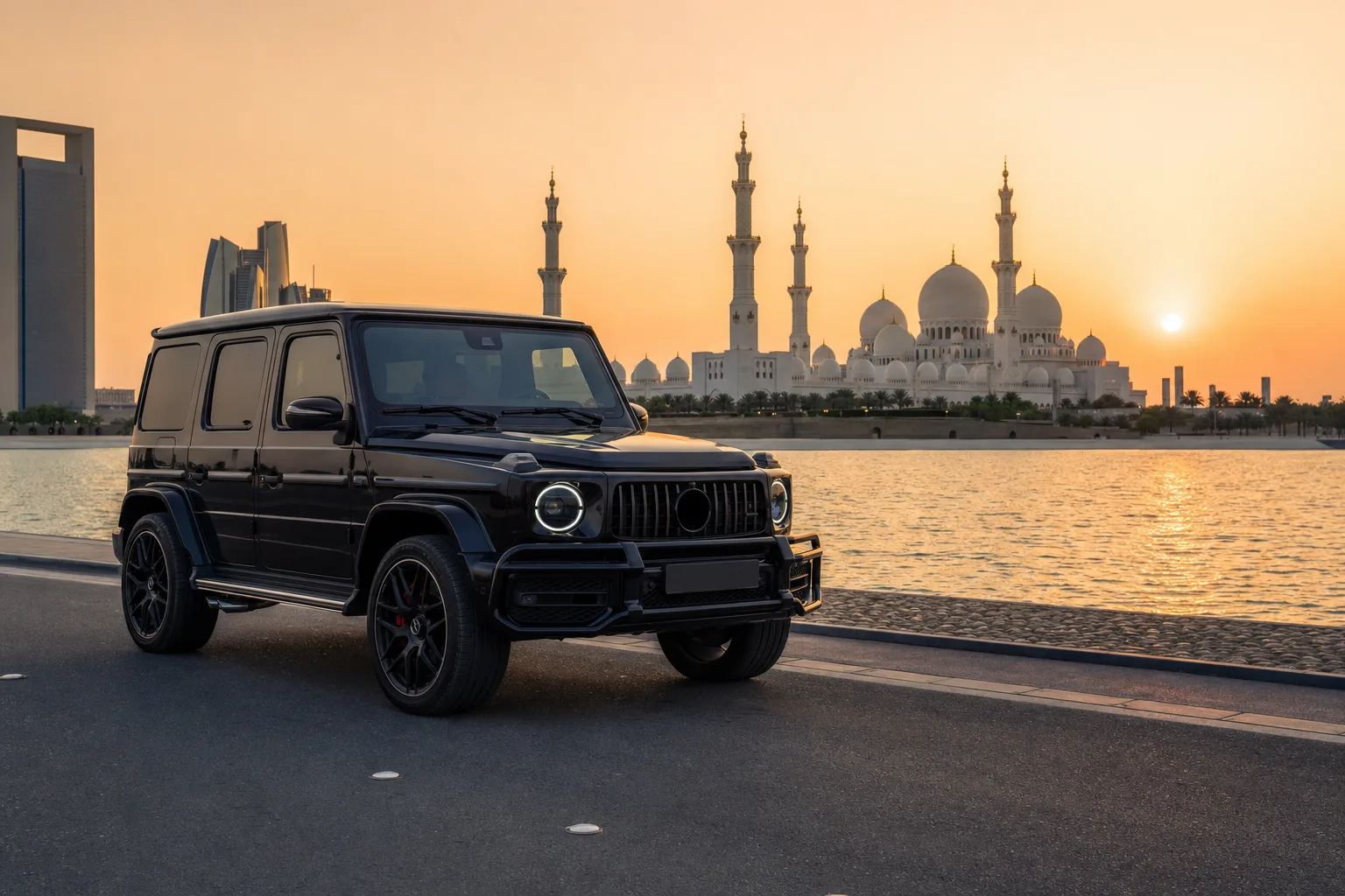 Mercedes G63 at Abu Dhabi corniche with Sheikh Zayed Grand Mosque skyline